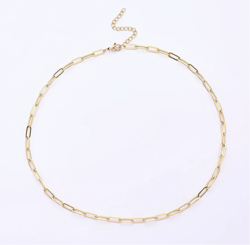 Gold chain necklace on a white background