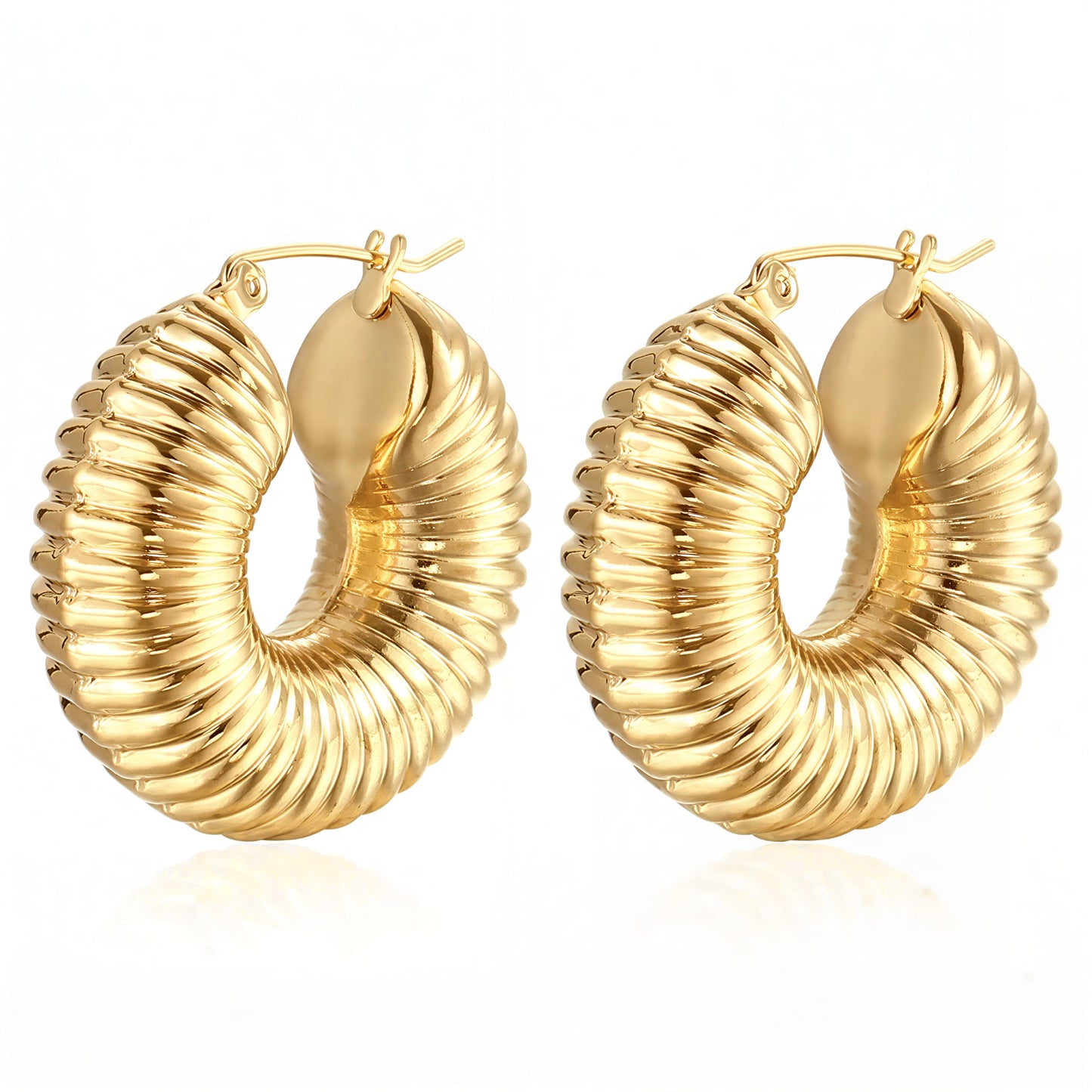Pair of gold hoop earrings on a white background